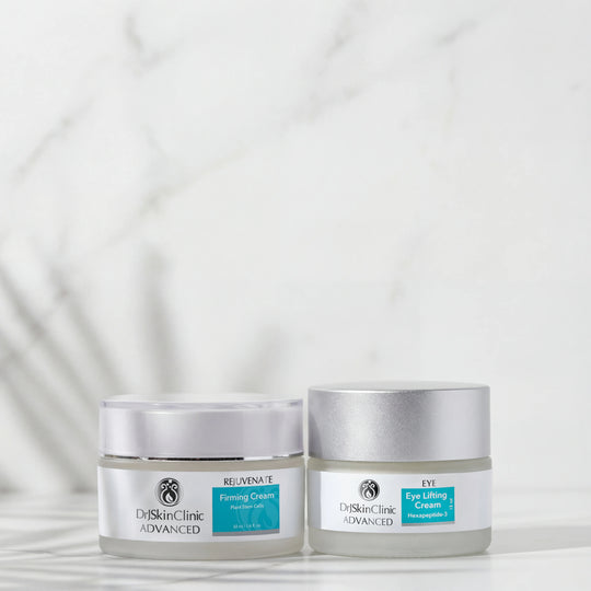 DrSkinClinic Advanced Face + Eye Firming Duo featuring Rejuvenate Firming Cream and Eye Lifting Cream displayed on a marble surface.