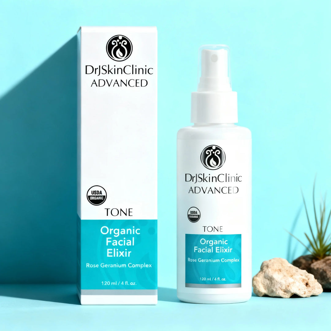 DrJSkinClinic Advanced Tone Organic Facial Elixir with Rose Geranium Complex, USDA Organic facial toner spray bottle and box on blue background