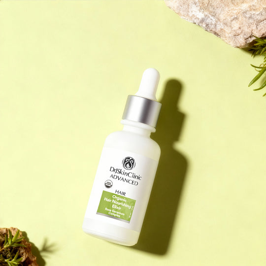 Dr. Skin Clinic Advanced Hair Organic Hair Nourishing Oil dropper bottle on a light green background with natural elements.