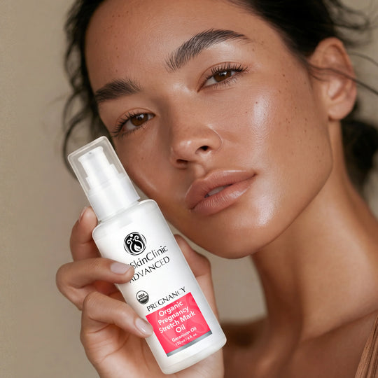 Model holding DrSkinClinic Advanced Organic Pregnancy Stretch Mark Oil with Geranium Oil, showcasing smooth radiant skin