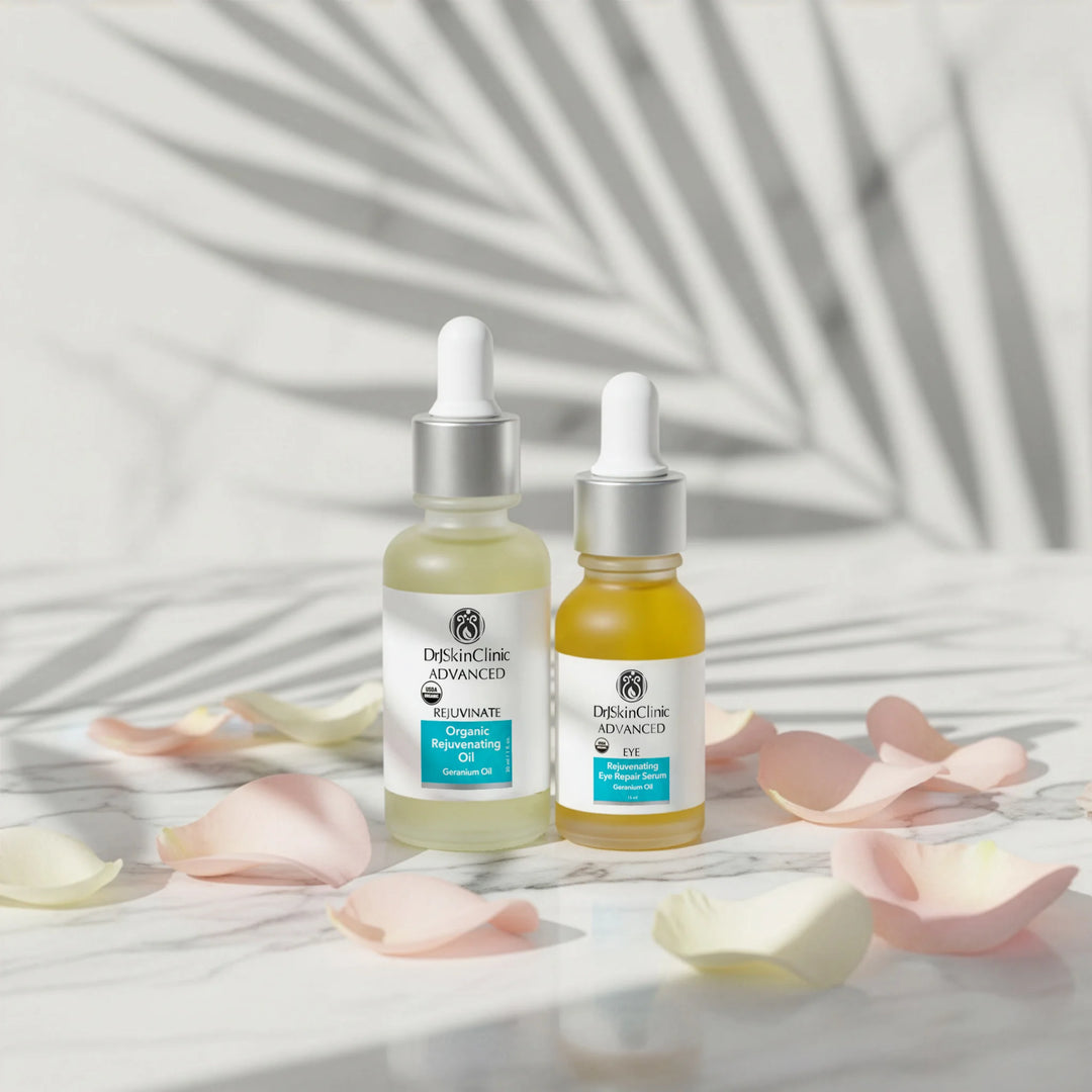 DrSkinClinic Advanced Rejuvenating Repair Duo displayed on a marble surface with soft floral petals and palm leaf shadows.