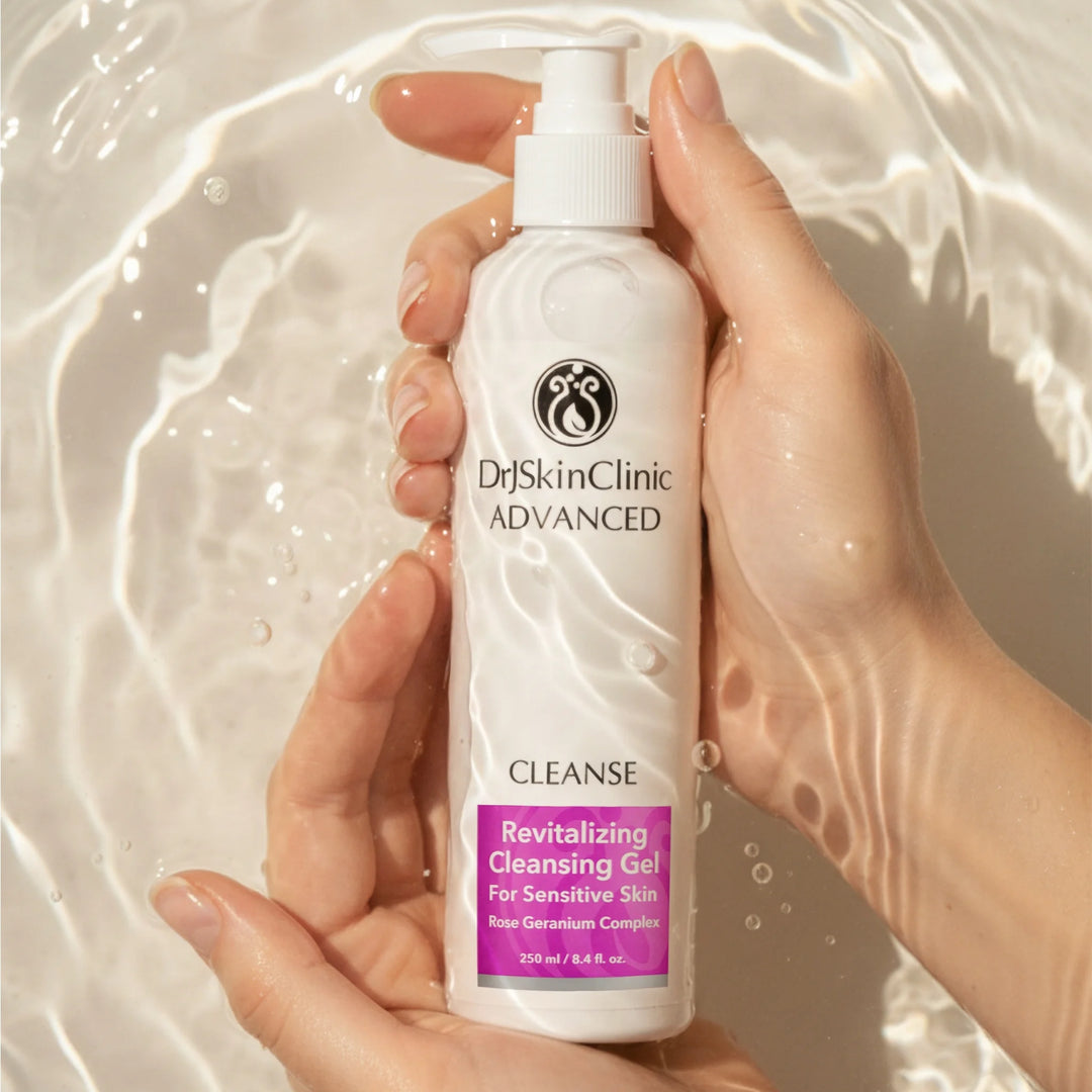 DrJSkinClinic Advanced Cleanse Revitalizing Cleansing Gel for Sensitive Skin held in hands surrounded by water, highlighting gentle hydrating facial cleanser